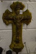An ormolu and velvet backed crucifix.