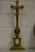A brass crucifix.