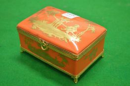 A French porcelain gilt decorated casket.