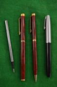 Three various pens.