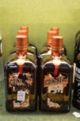 Six bottles of Cointreau (labels af).