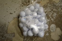 A bag of fifty Srixon golf balls.