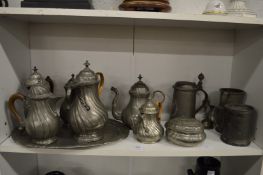 A quantity of Continental pewter jugs, coffee pots, tankards etc.