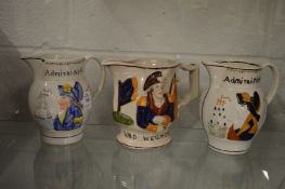 A Staffordshire jug commemorating Admiral Nelson together with a similar jug and another jug for