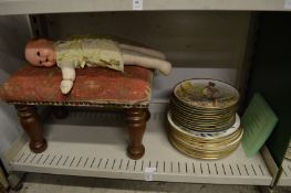 Collectors plates, a stool and a doll.