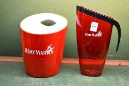 A Remy Martin perspex jug and ice bucket.