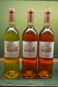 Chateau De Beaupre 2007, three bottles together with two bottles sparkling wine and a bottle of
