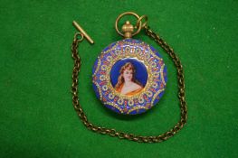 An ornate pocket watch with enamel and pearl decoration.