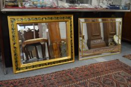 Two decorative gilt framed mirrors.