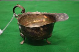 A silver sauceboat.