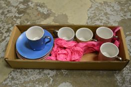Decorative coffee cups and saucers.