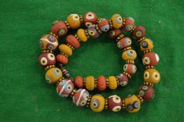 A Roman style bead necklace.