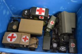 A quantity of die-cast military vehicles.