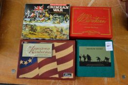 Four boxed military figures or groups, as new.