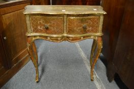 A French style gilt decorated two drawer side table.
