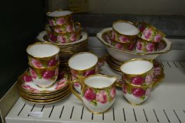 A quantity of Royal Albert china decorated with roses.