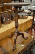 A George III style mahogany tripod table.
