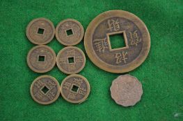 A small group of Chinese coins.