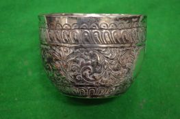 A Victorian small silver bowl with chased and engraved decoration.