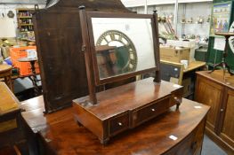 A George III mahogany dressing table mirror.