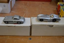 A Crescent toy cast metal model of Mercedes Benz grand prix car and another model of a Mercedes