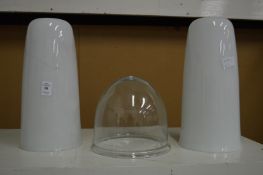 A pair of opaque glass lamp shades and another shade.
