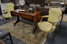 A pair of French giltwood armchairs.