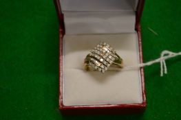 A 9ct gold dress ring.