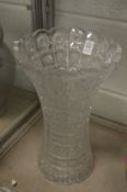 A large cut glass vase (base chipped).
