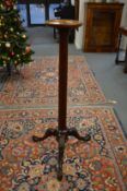 A mahogany tripod jardiniere stand.