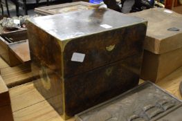 A brass bound burr wood decanter box containing three decanters.