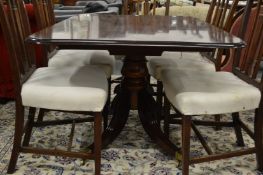 A 19th century mahogany rounded rectangular tilt top breakfast table on a quadruped base.