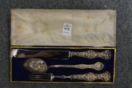 A Continental knife, fork and spoon set in a decorative fitted case.