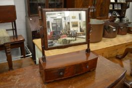A mahogany two drawer dressing table mirror.