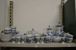 A quantity of blue and white onion pattern and similar china.