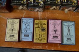 Five boxed Britains toy soldiers, as new.