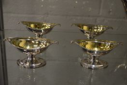 A good set of four silver and silver gilt pedestal salts.
