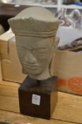 Carved stone bust.