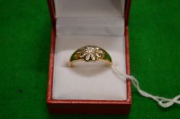 A 9ct gold and diamond ring.
