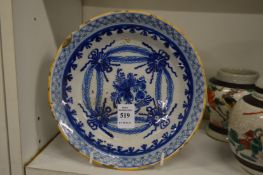 A delft circular blue and white dish.