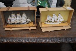 Four miniature sailing ships in original boxes.