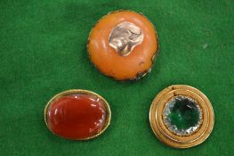 A brooch and other items.