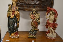 Three decorative painted figures, religious subjects and others.