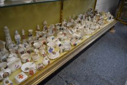 A large collection of crested china.