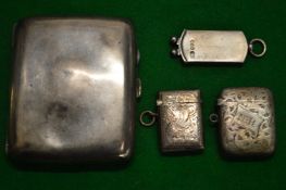 A silver cigarette case, two vesta cases and a cigar cutter.