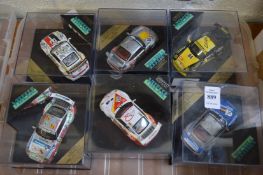 Six Vitesse boxed models of Porsche racing cars.