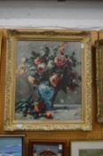 After Renoir, oleographic print of roses in a vase, decorative frame.