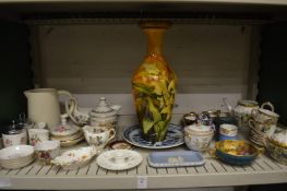 A small Royal Worcester twin handled bowl painted with fruit by F Roberts, handle repaired and other