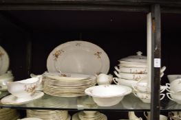 A large quantity of Royal Worcester dinner and coffee services all decorated with pears and plums.
