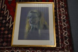 Portrait bust of a soulful young lady, pastel, signed.